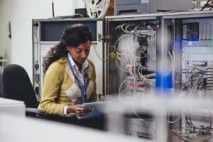 Woman working in server stack